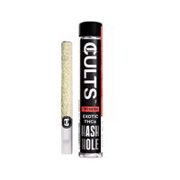 CULTS Exotic THCa Hash Hole preroll and branded glass tube packaging on black background